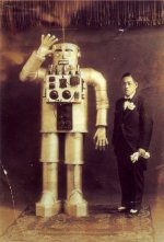 Yasutaro Mitsui and his steel humanoid robot in 1932, was the first known Japanese robot.jpg